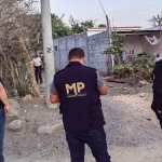 Personal del MP efectúa allanamientos contra una red de trata de migrantes. (Foto Prensa Libre: MP)