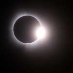 MARTIN, OHIO - APRIL 08: The moon passes in front of the sun during a solar eclipse on April 08, 2024 in Martin Ohio. Millions of people have flocked to areas across North America that are in the "path of totality" in order to experience a total solar eclipse. During the event, the moon will pass in between the sun and the Earth, appearing to block the sun. Gregory Shamus/Getty Images/AFP (Photo by Gregory Shamus / GETTY IMAGES NORTH AMERICA / Getty Images via AFP)
