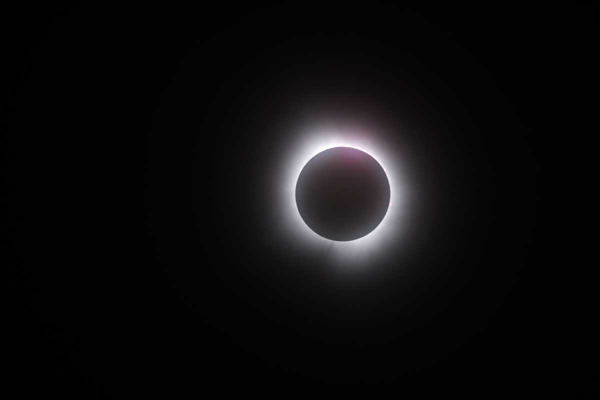 MARTIN, OHIO - APRIL 08: The moon passes in front of the sun during a solar eclipse on April 08, 2024 in Martin Ohio. Millions of people have flocked to areas across North America that are in the "path of totality" in order to experience a total solar eclipse. During the event, the moon will pass in between the sun and the Earth, appearing to block the sun.   Gregory Shamus/Getty Images/AFP (Photo by Gregory Shamus / GETTY IMAGES NORTH AMERICA / Getty Images via AFP)