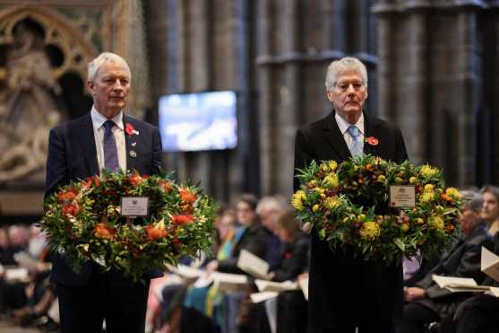 New Zealand's High Commissioner to the United Kingdom Phil Goff and Australia's High Commissioner to the United Kingdom Stephen Smith lay wreaths during a service of commemoration and thanksgiving to mark Anzac Day in Westminster Abbey in London in central London on April 25, 2024. Anzac Day marks the anniversary of the first major military action fought by Australian and New Zealand forces during the First World War. The Australian and New Zealand Army Corps (ANZAC) landed at Gallipoli in Turkey during World War I. (Photo by Belinda Jiao / POOL / AFP)