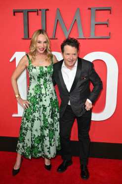 US actress Tracy Pollan (L) and Canadian-US activist Michael J. Fox attend the TIME100 Next Gala in New York City, on April 25, 2024. TIMEs annual TIME100 Next list recognizes 100 individuals who are defining the next generation of leadership  Artists, Phenoms, Leaders, Advocates and Innovators  poised to make the climb and in doing so, make history. (Photo by ANGELA WEISS / AFP)