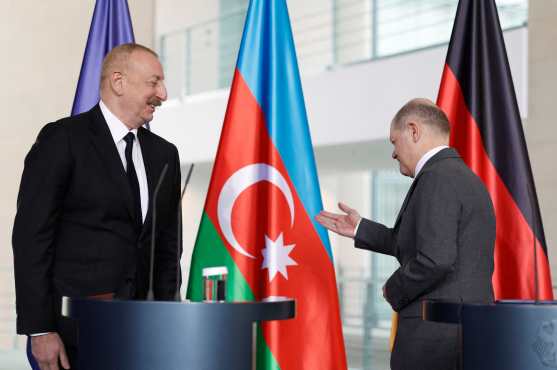 German Chancellor Olaf Scholz (R) and Azerbaijan's President Heydar Aliyev leave a press conference after talks at the Chancellery in Berlin, Germany on April 26, 2024. (Photo by Odd ANDERSEN / AFP)