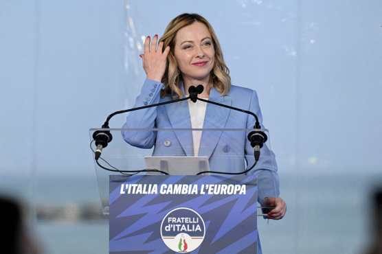 Italy's Prime Minister, Giorgia Meloni gestures during the campaign meeting of the far-right party Fratelli d'Italia (Brothers of Italy) ahead of the European Elections, on April 28, 2024 in Pescara. (Photo by Tiziana FABI / AFP)