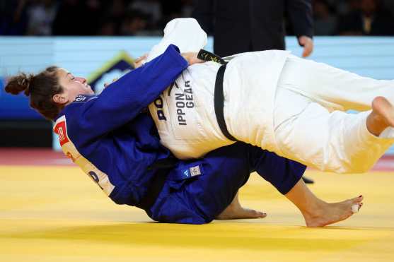 Israel's Inbar Lanir (blue) competes against Portugal's Patricia Sampaio (white) during the bronze women -78 kg individual bout of the Judo European Championships Seniors at the Arena Zagreb, in Zagreb, on April 27, 2024. (Photo by Damir SENCAR / AFP)