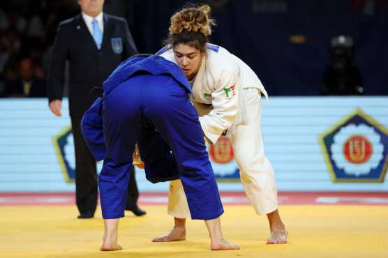 Israel's Inbar Lanir (blue) competes against Portugal's Patricia Sampaio (white) during the bronze women -78 kg individual bout of the Judo European Championships Seniors at the Arena Zagreb, in Zagreb, on April 27, 2024. (Photo by Damir SENCAR / AFP)