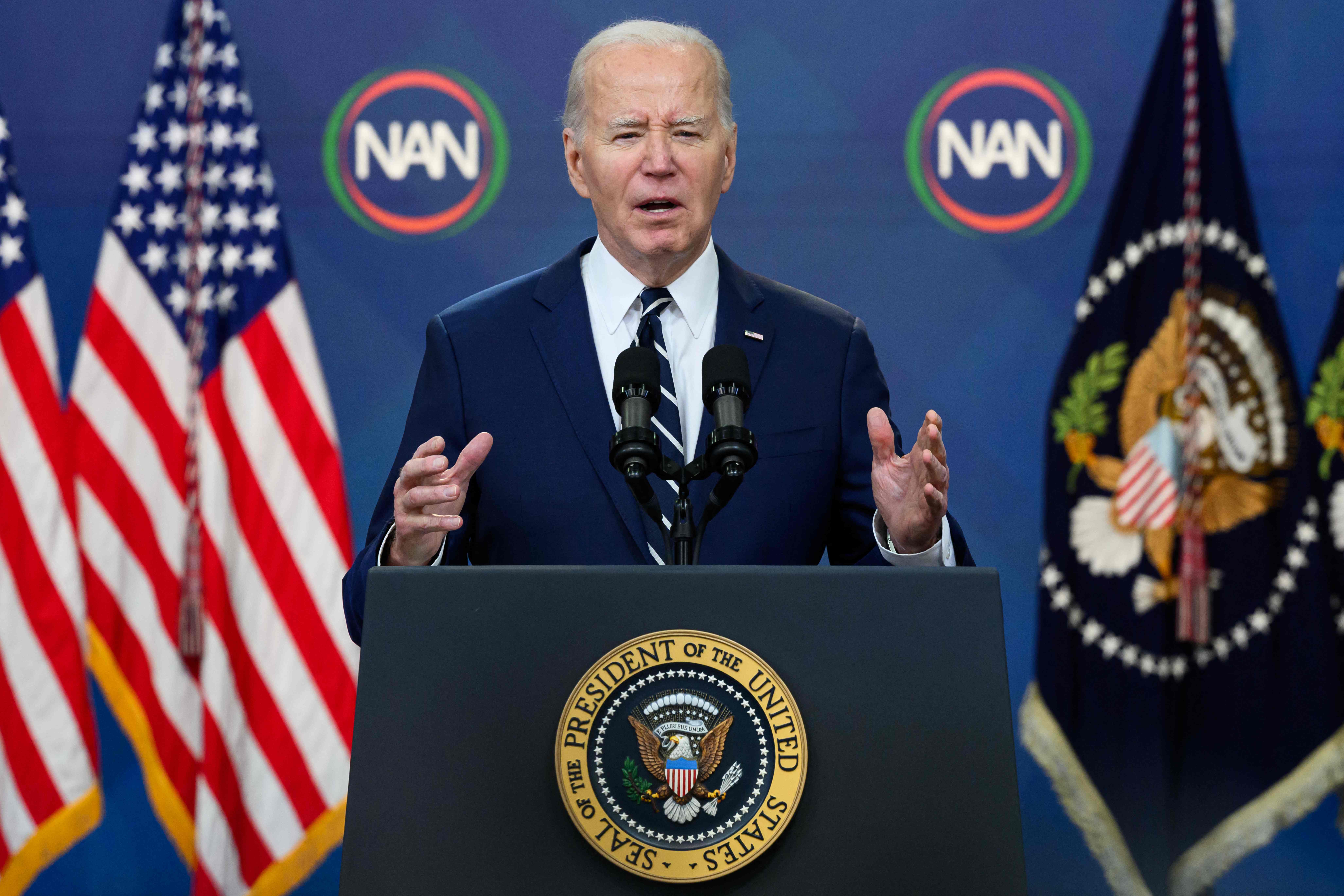 US President Joe Biden makes a virtual address to the National Action Network Convention in the South Court Auditorium of the Eisenhower Executive Office Building, in Washington, DC, on April 12, 2024. (Photo by Mandel NGAN / AFP)