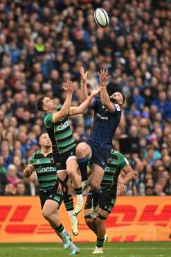 Northampton Saints' Tom James (L) and Leinster's Irish centre Robbie Henshaw (R) compete for a high ball during the European Champions Cup semi-final rugby union match between Leinster and Northampton Saints at Croke Park stadium, in Dublin, on May 4, 2024. (Photo by Oli SCARFF / AFP)