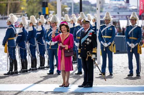 King Carl XVI Gustaf of Sweden (R) and Queen Silvia of Sweden react at Skeppsbron in Stockholm, Sweden, on May 6, 2024 upon the arrival of King Frederik X of Denmark and Queen Mary of Denmark. King Frederik X and Queen Mary of Denmark are on a State Visit to Sweden 6-7 May, 2024. (Photo by Jonathan NACKSTRAND / AFP)