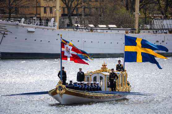 King Frederik X of Denmark and Queen Mary of Denmark onboard the Royal Barge Vasaorden arrive for a visit in Stockholm, Sweden, on May 6, 2024. King Frederik X and Queen Mary of Denmark are on a State Visit to Sweden 6-7 May, 2024. (Photo by Jonathan NACKSTRAND / AFP)