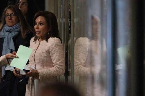 US television personality Jeanine Pirro is seen in a hallway outside the courtroom during former US President Donald Trump's trial for allegedly covering up hush money payments linked to extramarital affairs, at Manhattan Criminal Court in New York City, on May 10, 2024. Trump is accused of falsifying business records in a scheme to cover up an alleged sexual encounter with adult film actress Stormy Daniels to shield his 2016 election campaign from adverse publicity. (Photo by JEENAH MOON / POOL / AFP)