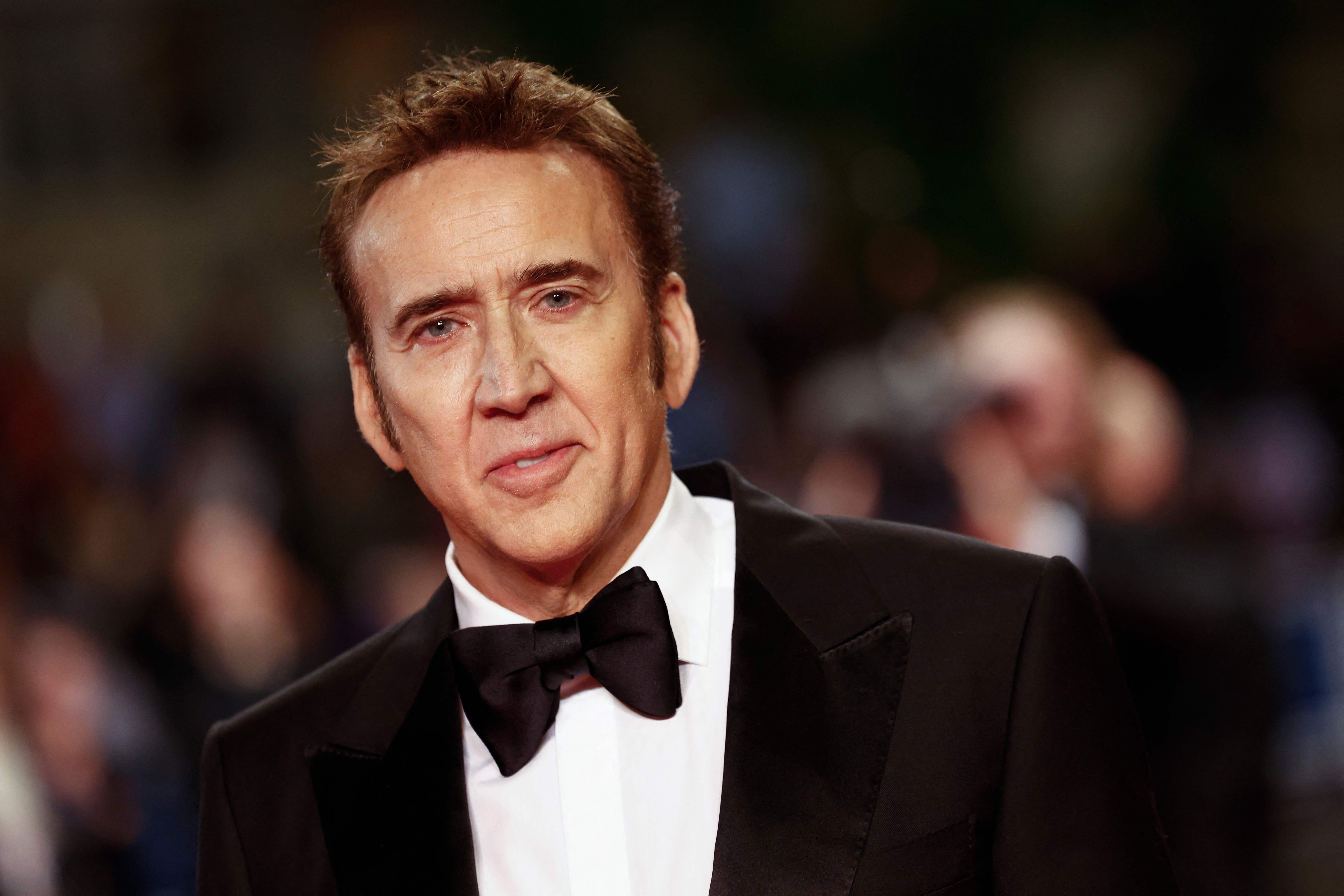 US actor Nicolas Cage arrives for the screening of the film "The Surfer" at the 77th edition of the Cannes Film Festival in Cannes, southern France, on May 18, 2024. (Photo by Sameer Al-Doumy / AFP)