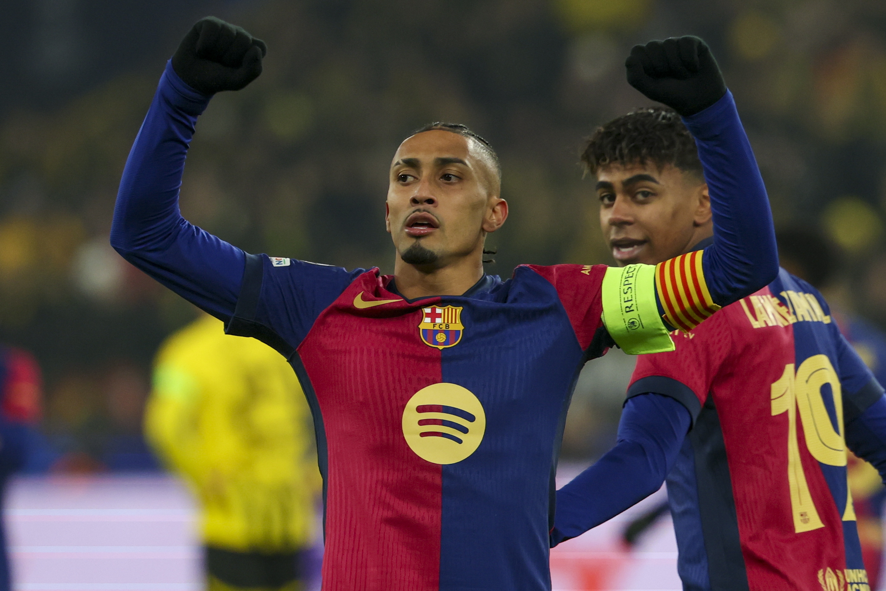 Raphinha celebrates a goal during a Champions League match in 2024