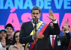 Venezuela's President Nicolas Maduro delivers a speech in front of Miraflores presidential palace in Caracas on January 10, 2025. Maduro, in power since 2013, took the oath of office for a third term despite a global outcry that brought thousands out in protest on the ceremony's eve. (Photo by Federico PARRA / AFP)