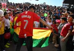 Fans of Portugal's forward Cristiano Ronaldo gather in a square in La Paz on February 5, 2025, to celebrate his 40th birthday. (Photo by AIZAR RALDES / AFP)