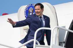 US Secretary of State Marco Rubio boards a plane en route to El Salvador at Panama Pacifico International Airport in Panama City on February 3, 2025. Rubio is in Panama on a two-day official visit. (Photo by Mark Schiefelbein / Pool AP / AFP)