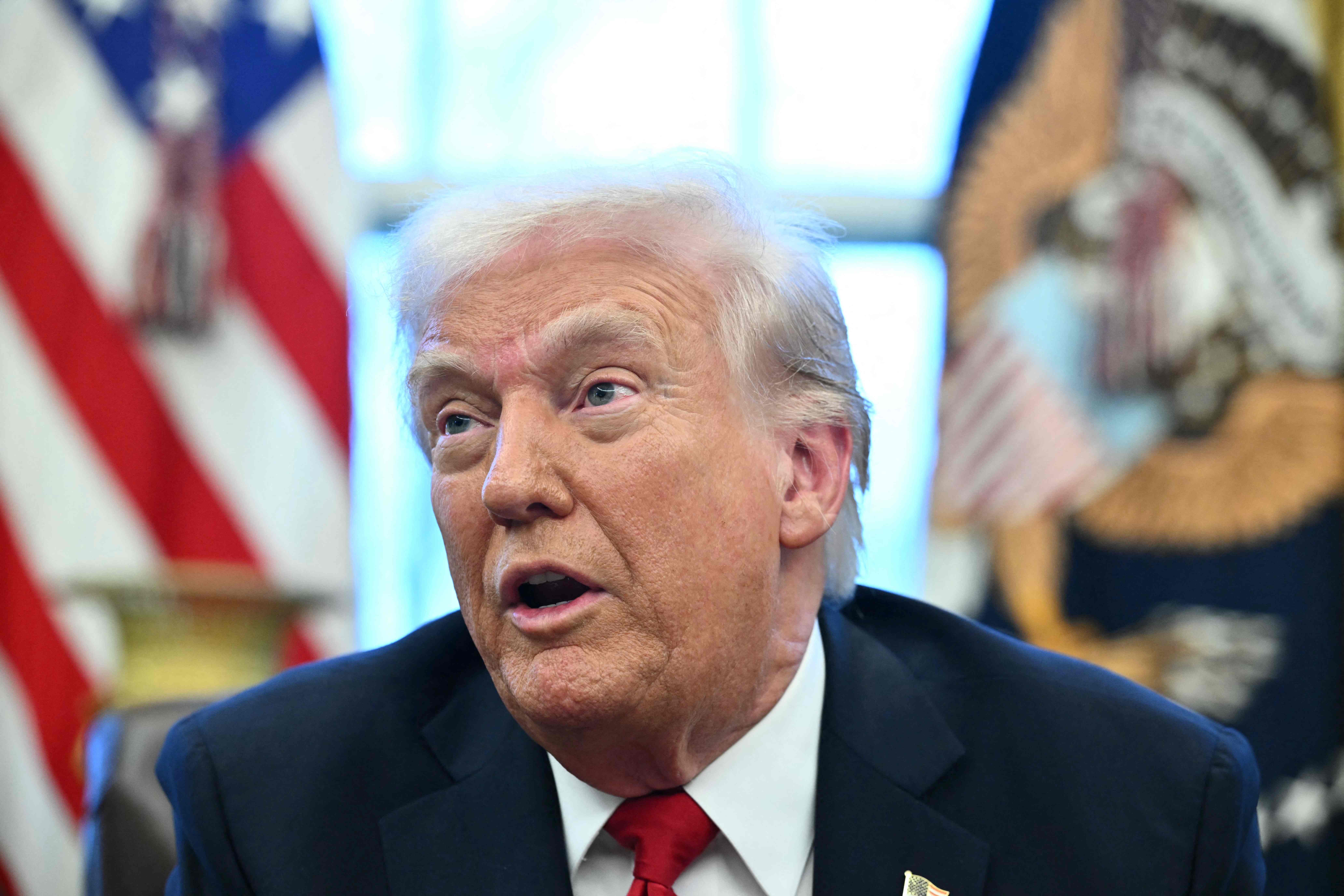 US President Donald Trump Announces Tariffs on Auto Imports in the Oval Office of the White House in Washington, DC, On March 26, 2025. Trump announced IMPOSITION OF 25 PERENT TARIFS ON ALL CARS AND LIGHT TRUCKS NOT BUILT ON US SOIL. "What We're Going To Be Doing Is A 25 Percent Tariff on All Cars That Are Not Made In The United States. If they're made in the United States, it is absolutely not tariff," HE ANNOUNCED AT THE WHITE HOUSE. (Photo by Mandel Ngan / AFP)