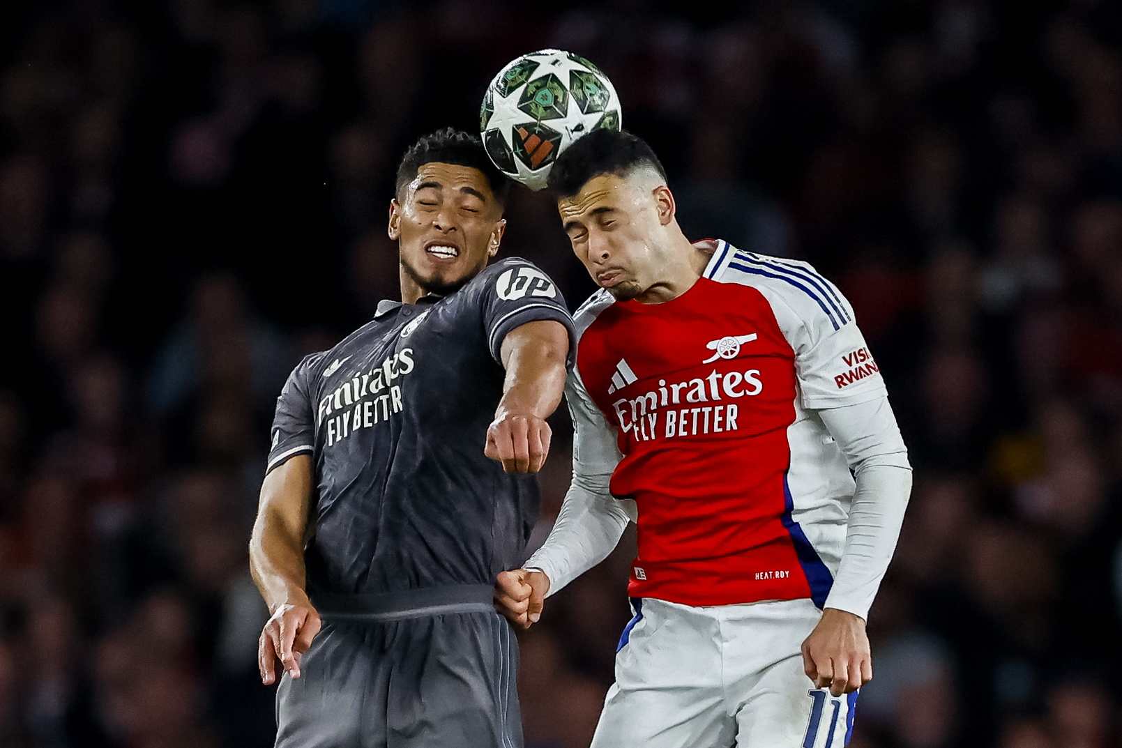 Gabriel Martinelli of Arsenal and Jude Bellingham of Real Madrid during the first leg in London