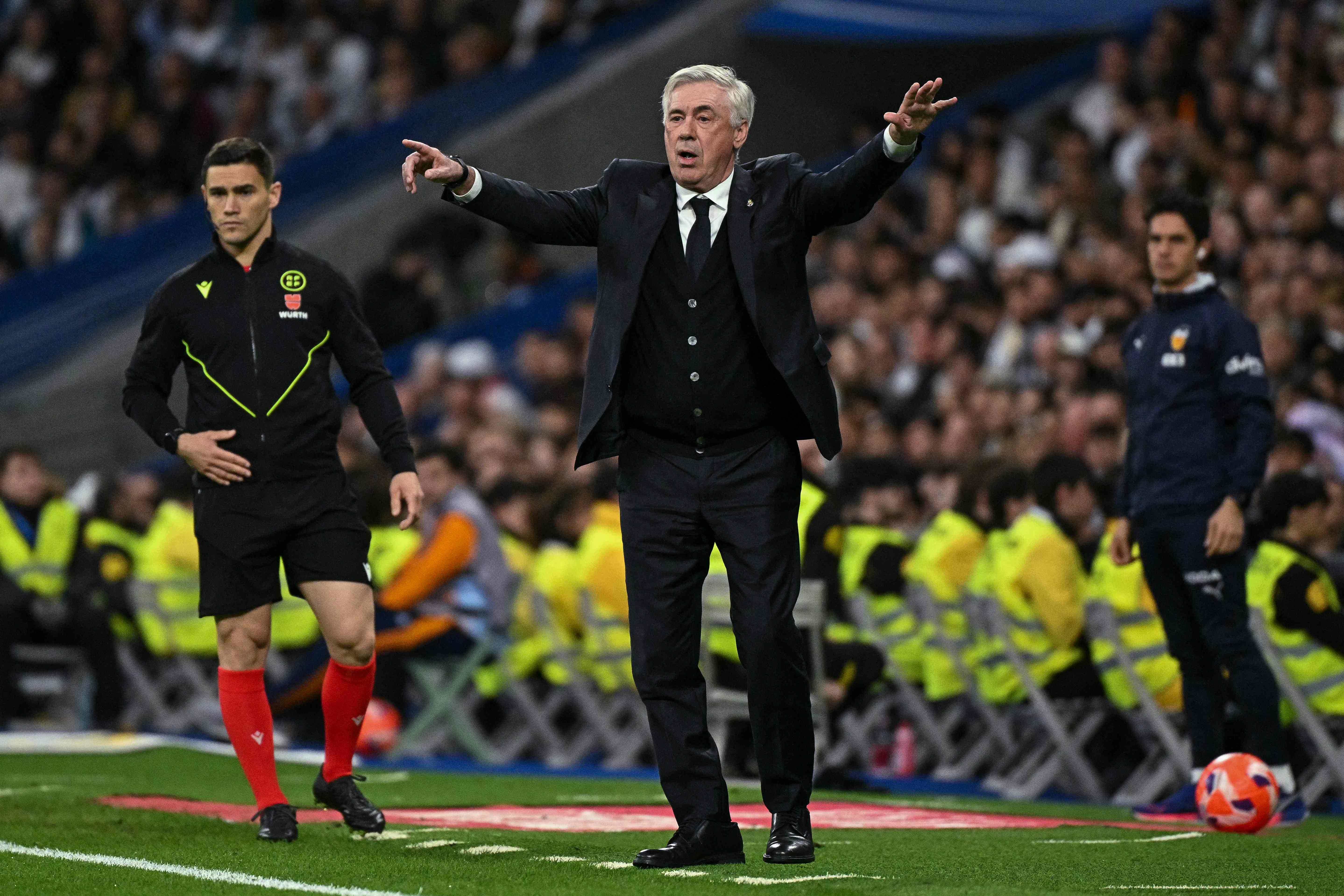 Real Madrid's Italian Coach Carlo Ancelotti Gestures During the Spanish League Football Between Real Madrid CF and Valencia CF AT the Santiago Bernabeu Stadium in Madrid on April 5, 2025. (Photo by Javier Soriano / AFP)