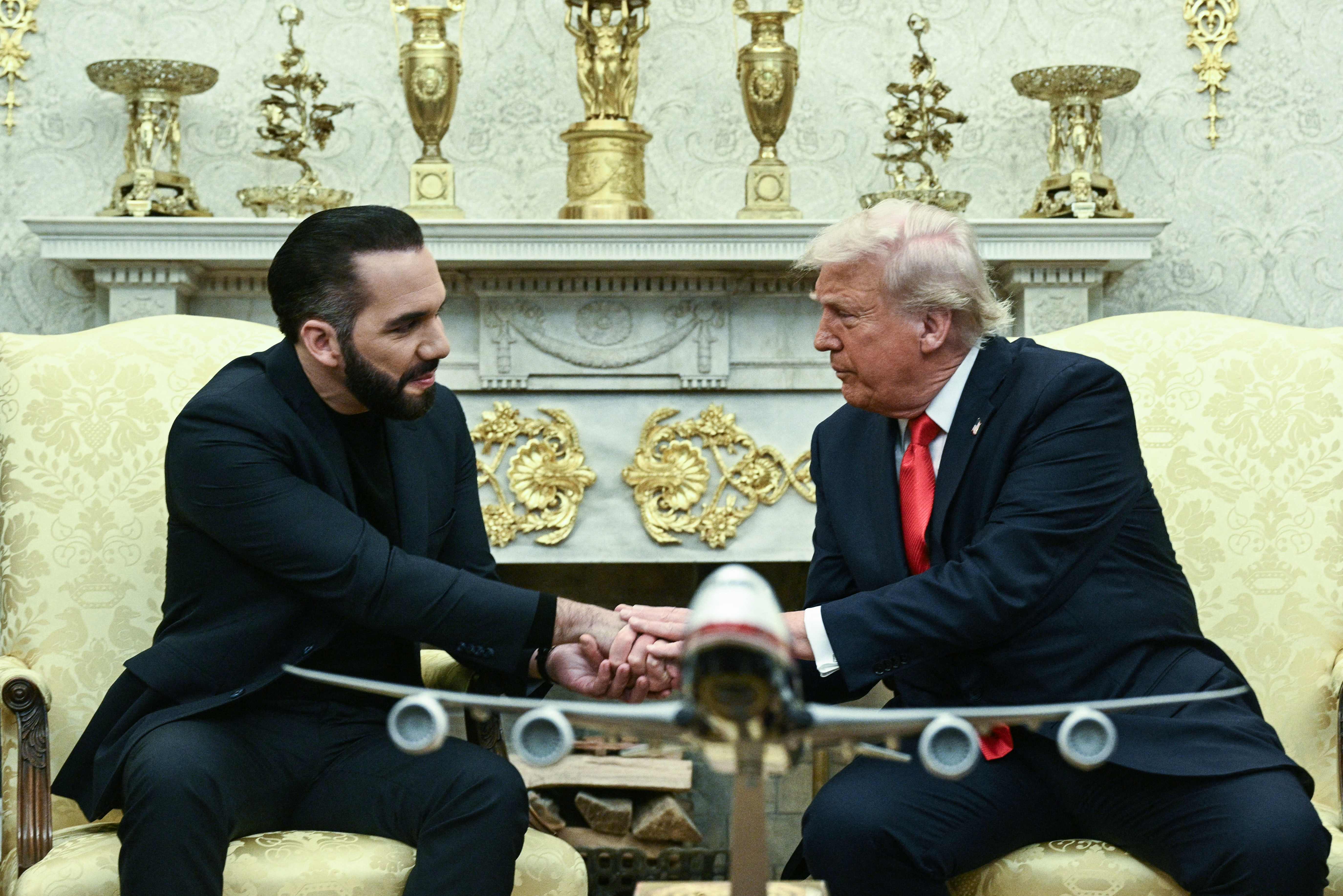 (FILES) US President Donald Trump meets with El Salvador's President Nayib Bukele in the Oval Office of the White House in Washington, DC, April 14, 2025. President Donald Trump wants to abolish birthright citizenship and ship violent criminals -- if he can, even US citizens -- to a notorious Salvadoran prison. He has mocked, insulted and belittled federal judges. And he has forced some of the country's most prestigious law firms into painful submission. In short, Trump has tested the rule of law -- a vital and fundamental pillar of American democracy -- as perhaps never before. When Trump welcomed Salvadoran President Nayib Bukele to the White House, he said he was entertaining the possibility of shipping American citizens who have committed violent acts to be jailed in El Salvador. Trump said he had asked Attorney General Pam Bondi to explore that possibility, though legal experts say it would be clearly unconstitutional. (Photo by Brendan SMIALOWSKI / AFP)