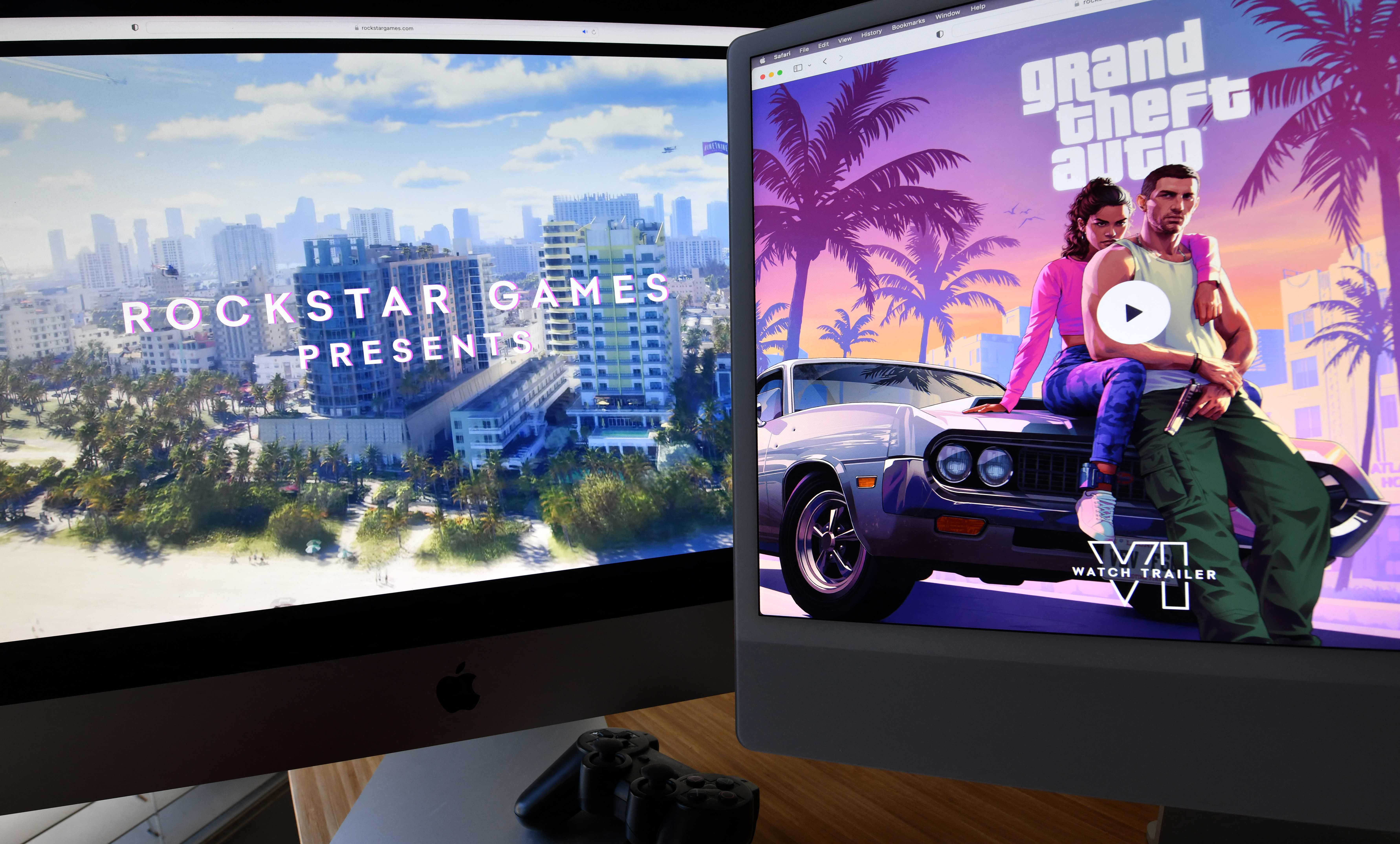 (FILES) This illustration photo created in Los Angeles, California, on December 5, 2023, shows Rockstar Games Grand Theft Auto 6 trailer played on computer screens. The much-awaited release of Grand Theft Auto VI, the latest installment of the popular video game series, has been postponed by several months to May 2026, its publisher said on May 2, 2025. (Photo by Chris DELMAS / AFP)