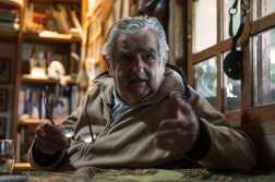 (FILES) Uruguayan President Jose Mujica gestures during an interview with Agence France-Presse at his house, on the outskirts of Montevideo on July 9, 2014. Uruguay's former president (2010-2015) Jose "Pepe" Mujica, a former guerrilla fighter and icon of the left in Latin America, died at the age of 89 on May 13, 2025, the government announced. The farmer dubbed the "world's poorest president" during his presidency for his modest lifestyle had been diagnosed with cancer of the esophagus in May 2024. (Photo by DANIEL CASELLI / AFP)