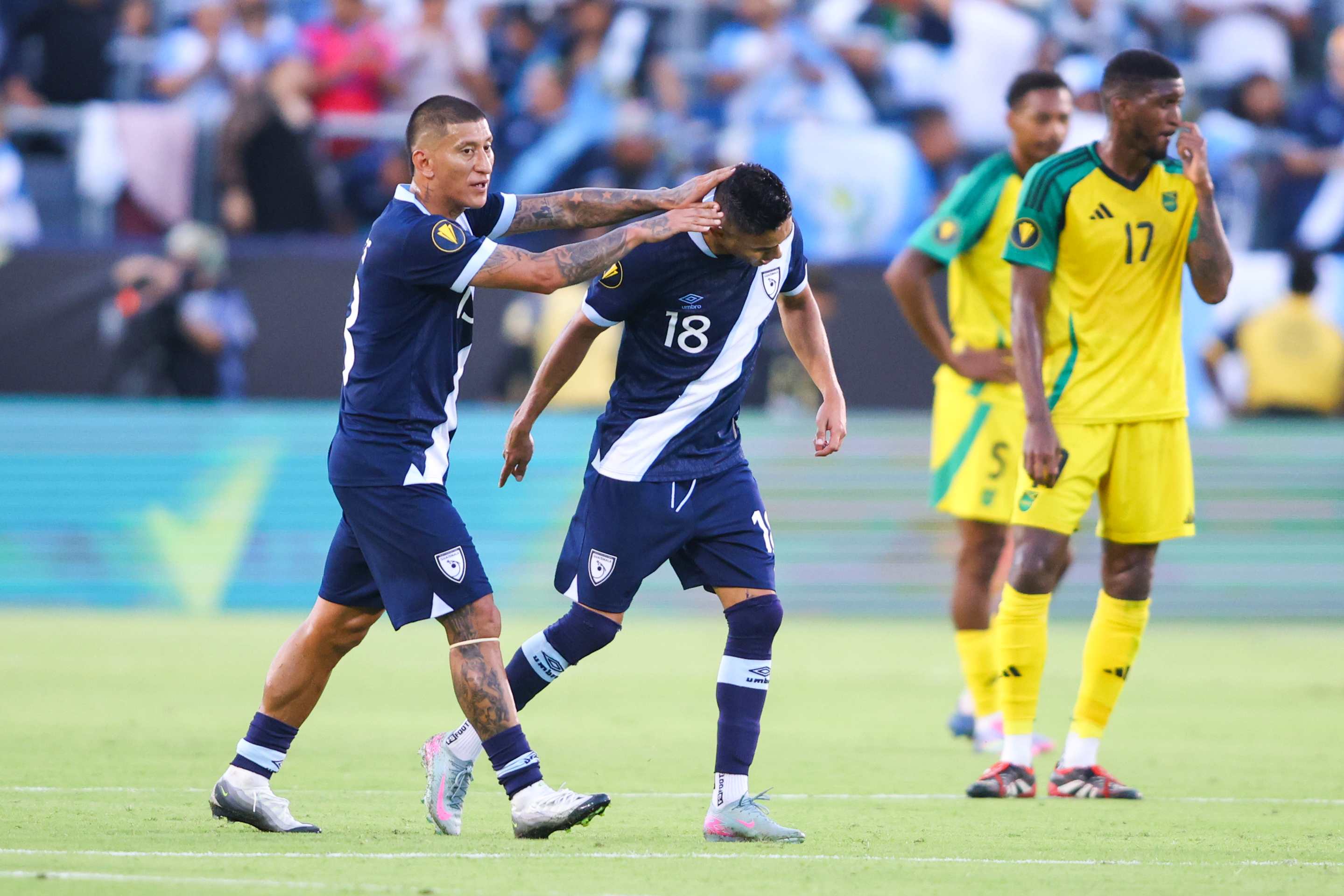 The Guatemalan Óscar Santis celebrates a goal against Jamaica.