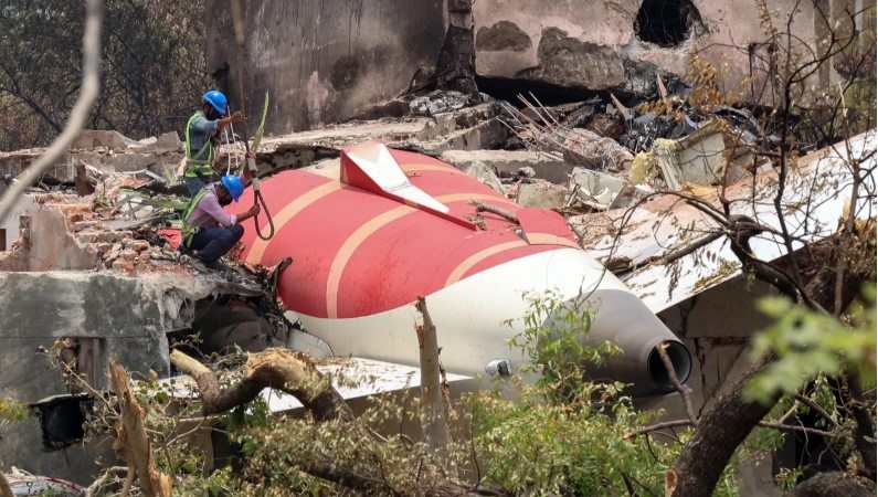 Images of the Air India plane that crashed into a residential area. (Free Press Photo: EFE)