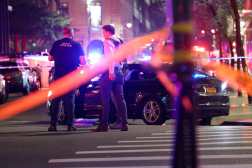NEW YORK, NEW YORK - JULY 28: Police work at the scene of a fatal shooting in midtown Manhattan on July 28, 2025 in New York City. An NYPD officer and at least three others were killed, with another seriously injured in the attack inside an office building, according to published reports. The 27-year-old suspect died of a self-inflicted gunshot wound to the head, the reports said.   Spencer Platt/Getty Images/AFP (Photo by SPENCER PLATT / GETTY IMAGES NORTH AMERICA / Getty Images via AFP)
