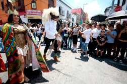 A dancer wears a mask during the "Tastuanes" (an indigenous pre-Columbian word for "leaders"), a Catholic feast in veneration of Santo Santiago (Saint James the Apostle) in Tonala, Jalisco State, Mexico on July 25, 2025. (Photo by ULISES RUIZ / AFP)