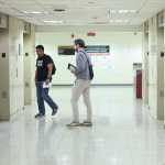 NEW YORK, NEW YORK - SEPTEMBER 03: A man is escorted into an elevator after a court hearing in immigration court at the Jacob K. Javitz Federal Building on September 03, 2025 in New York City. Immigration and Customs Enforcement (ICE) agents and other federal agencies continue to make detainments in immigration courts as people attend their court hearings. According to data from the Deportation Data Project ICE has deported more than three times the number of immigrant New Yorkers who were removed in all of last year mostly driven by driven by detainments at 26 Federal Plaza. Michael M. Santiago/Getty Images/AFP (Photo by Michael M. Santiago / GETTY IMAGES NORTH AMERICA / Getty Images via AFP)
