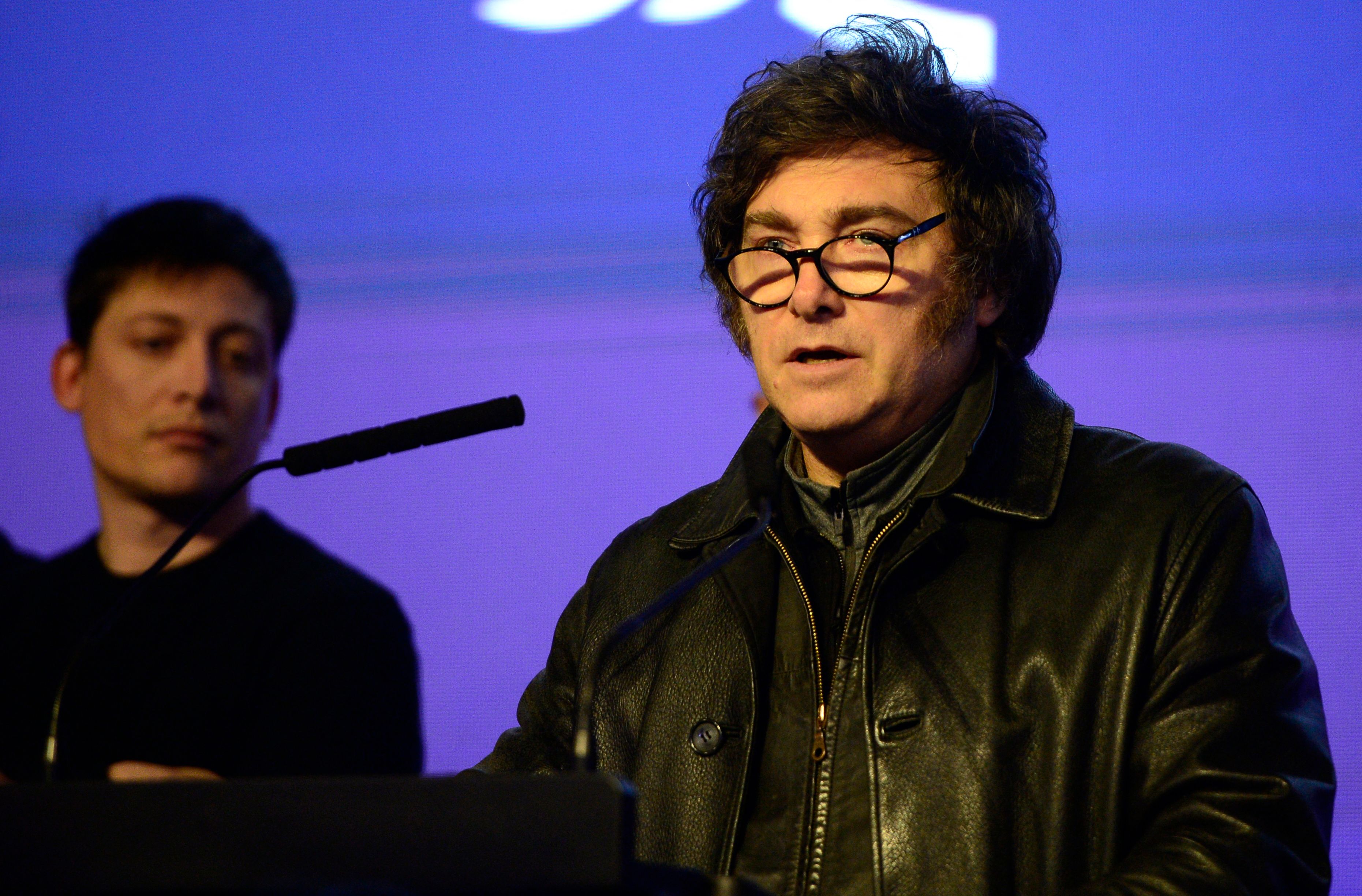 Argentina's President Javier Milei speaks after the provincial midterm elections in La Plata, Buenos Aires province, Argentina on September 7, 2025. Milei vowed to "accelerate" his libertarian reforms after a crushing defeat in Buenos Aires provincial elections, ahead of highly anticipated midterms. (Photo by AFP)