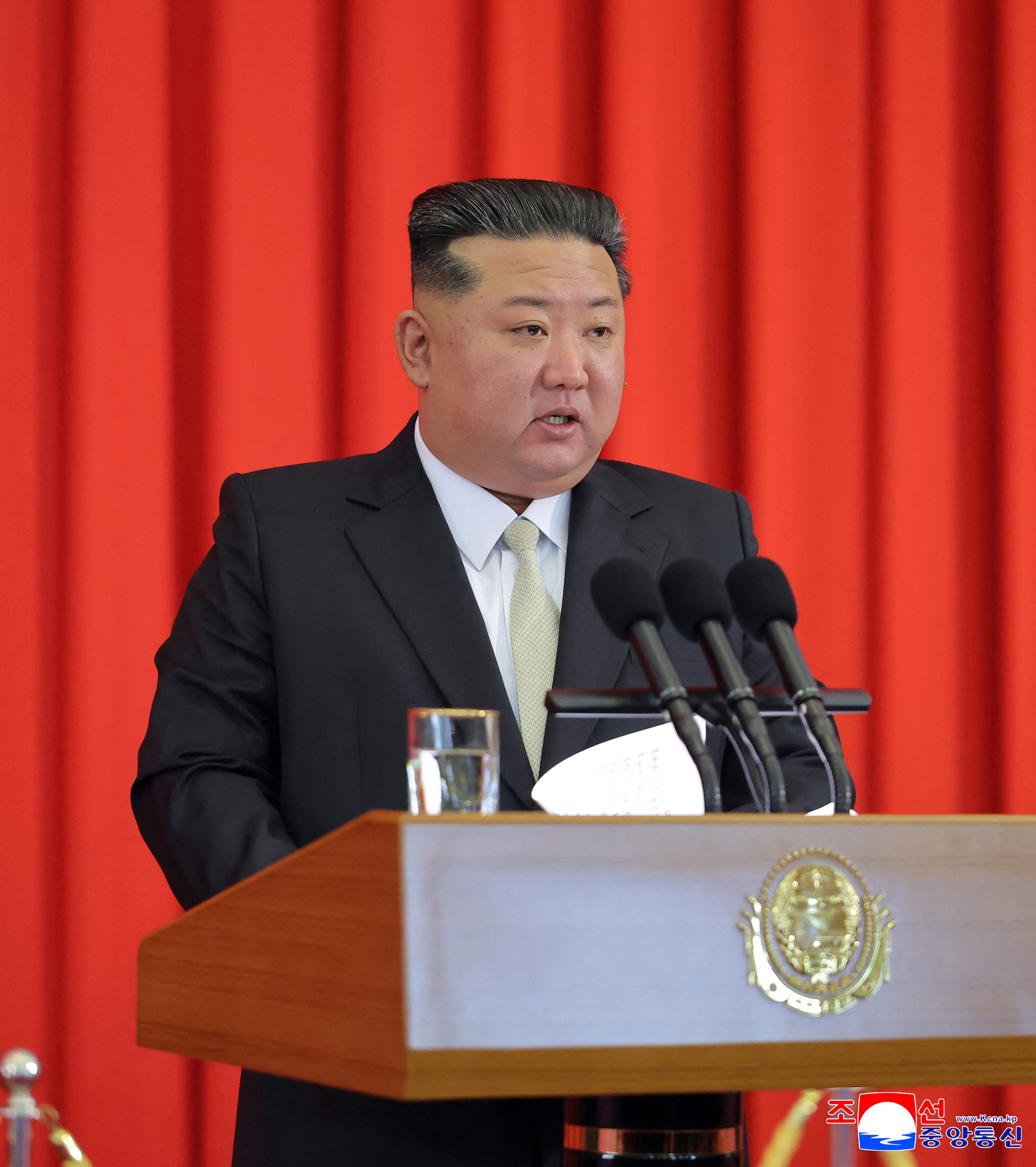 This picture taken on September 9, 2025 and released by North Korea's official Korean Central News Agency (KCNA) via KNS on September 10, 2025 shows North Korean leader Kim Jong Un speaking at the flag-raising ceremony and central oath-taking rally to commemorate the 77th anniversary of the founding of the Democratic People's Republic of Korea at Mansudae Assembly Hall in Pyongyang. (Photo by KCNA VIA KNS / AFP) / South Korea OUT / ---EDITORS NOTE--- RESTRICTED TO EDITORIAL USE - MANDATORY CREDIT "AFP PHOTO/KCNA VIA KNS" - NO MARKETING NO ADVERTISING CAMPAIGNS - DISTRIBUTED AS A SERVICE TO CLIENTS
THIS PICTURE WAS MADE AVAILABLE BY A THIRD PARTY. AFP CAN NOT INDEPENDENTLY VERIFY THE AUTHENTICITY, LOCATION, DATE AND CONTENT OF THIS IMAGE. /
