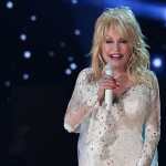 (FILES) US singer Dolly Parton performs onstage during the 61st Annual Grammy Awards on February 10, 2019, in Los Angeles. A very much alive Dolly Parton took to Instagram on October 8, 2025, to declare "I ain't dead yet!" after her sister sent fans into a tailspin when she called for prayers for one of America's most beloved celebrities. In a video posted to her official account, the 79-year-old Queen of Country thanked the public for their concern, but insisted she was not at death's door. (Photo by Robyn Beck / AFP)