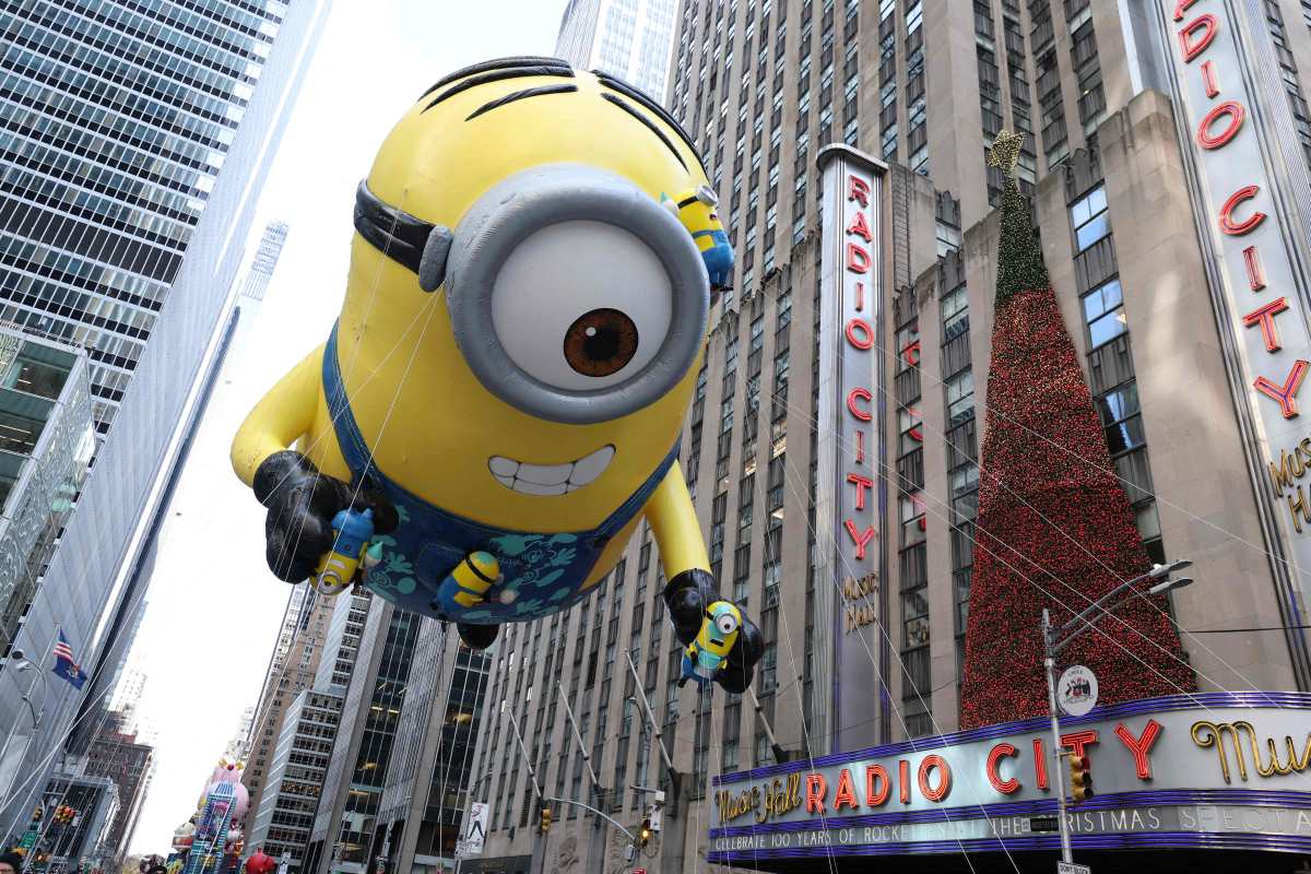 Stuart the Minion floats down the street during the annual Macy's Thanksgiving Day Parade in New York City on November 27, 2025. (Photo by TIMOTHY A.CLARY / AFP)