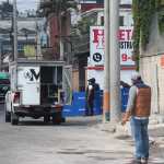 Vehículo del Ministerio Público procesando una escena del crimen en Guatemala.