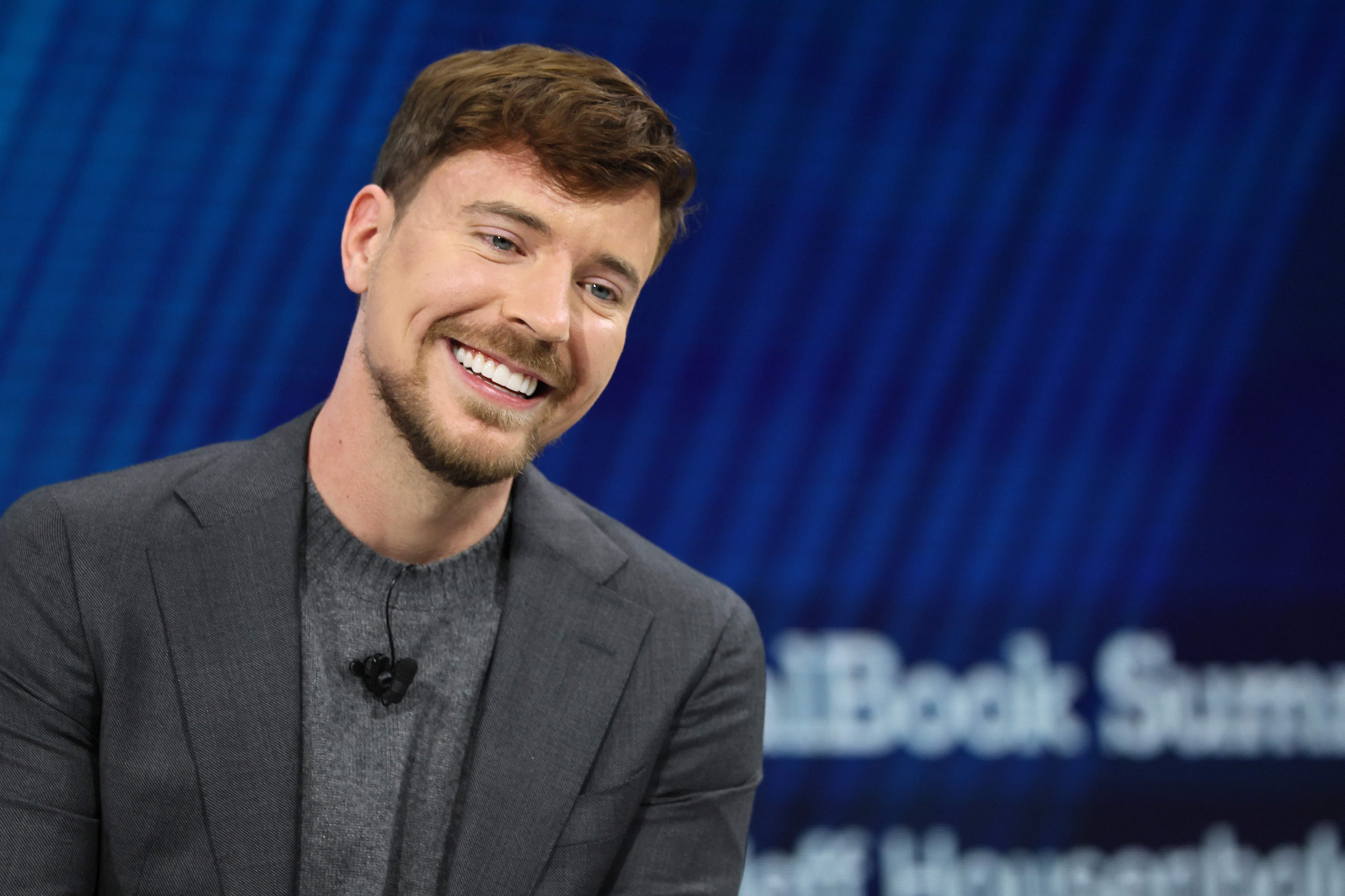 NEW YORK, NEW YORK - DECEMBER 03: MrBeast, Creator, Entrepreneur and Philanthropist Jimmy Donaldson laughs as he speaks onstage during the 2025 New York Times Dealbook Summit at Jazz at Lincoln Center on December 03, 2025 in New York City. NYT columnist Sorkin hosted the annual Dealbook summit which brings together business and government leaders to discuss the most important stories across business, politics and culture.   Michael M. Santiago/Getty Images/AFP (Photo by Michael M. Santiago / GETTY IMAGES NORTH AMERICA / Getty Images via AFP)