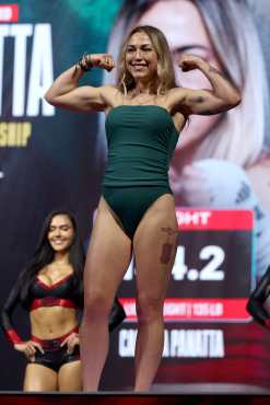 MIAMI, FLORIDA - DECEMBER 18: Camilla Panatta poses on the scale during her ceremonial weigh-in ahead her fight as part of Jake Paul v Anthony Joshua at The Fillmore Miami Beach on December 18, 2025 in Miami Beach, Florida. Leonardo Fernandez/Getty Images/AFP (Photo by Leonardo Fernandez / GETTY IMAGES NORTH AMERICA / Getty Images via AFP)