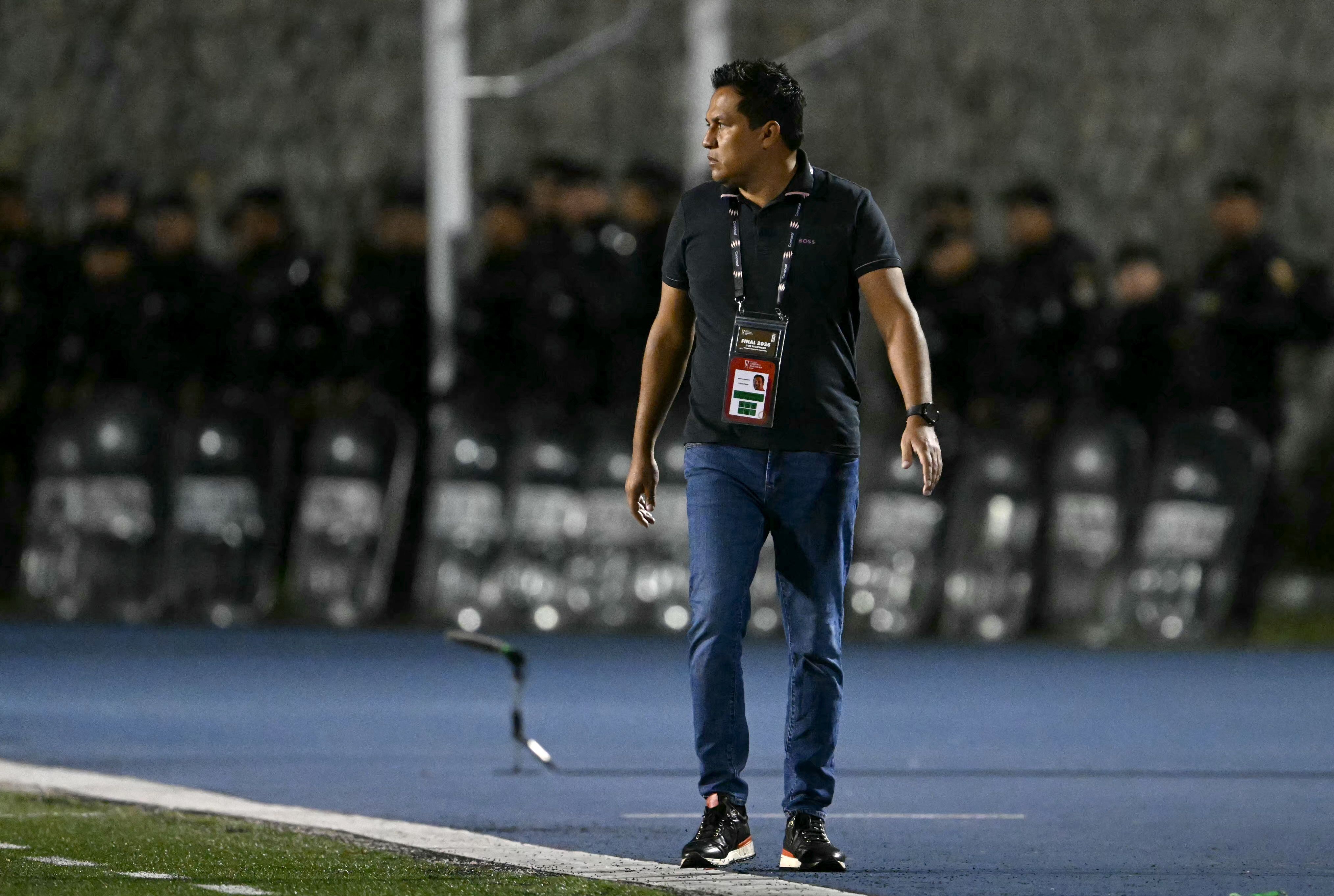 Xelaju's head coach Amarini Villatoro gestures during the second leg of the CONCACAF Central American Cup final football match between Guatemala's Xelaju and Costa Rica's Alajuelense at Mario Camposeco Stadium in Quetzaltenango, Guatemala, on December 3, 2025. (Photo by JOHAN ORDONEZ / AFP)