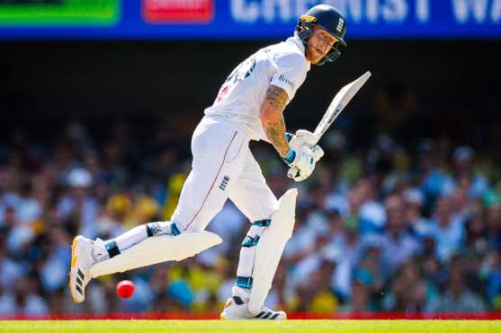 England's Ben Stokes runs between the wickets during day four of the second Ashes cricket Test match between Australia and England at The Gabba in Brisbane on December 7, 2025. (Photo by Patrick HAMILTON / AFP) / --IMAGE RESTRICTED TO EDITORIAL USE - STRICTLY NO COMMERCIAL USE--