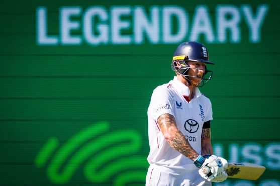 England's Ben Stokes looks on during day four of the second Ashes cricket Test match between Australia and England at The Gabba in Brisbane on December 7, 2025. (Photo by Patrick HAMILTON / AFP) / --IMAGE RESTRICTED TO EDITORIAL USE - STRICTLY NO COMMERCIAL USE--