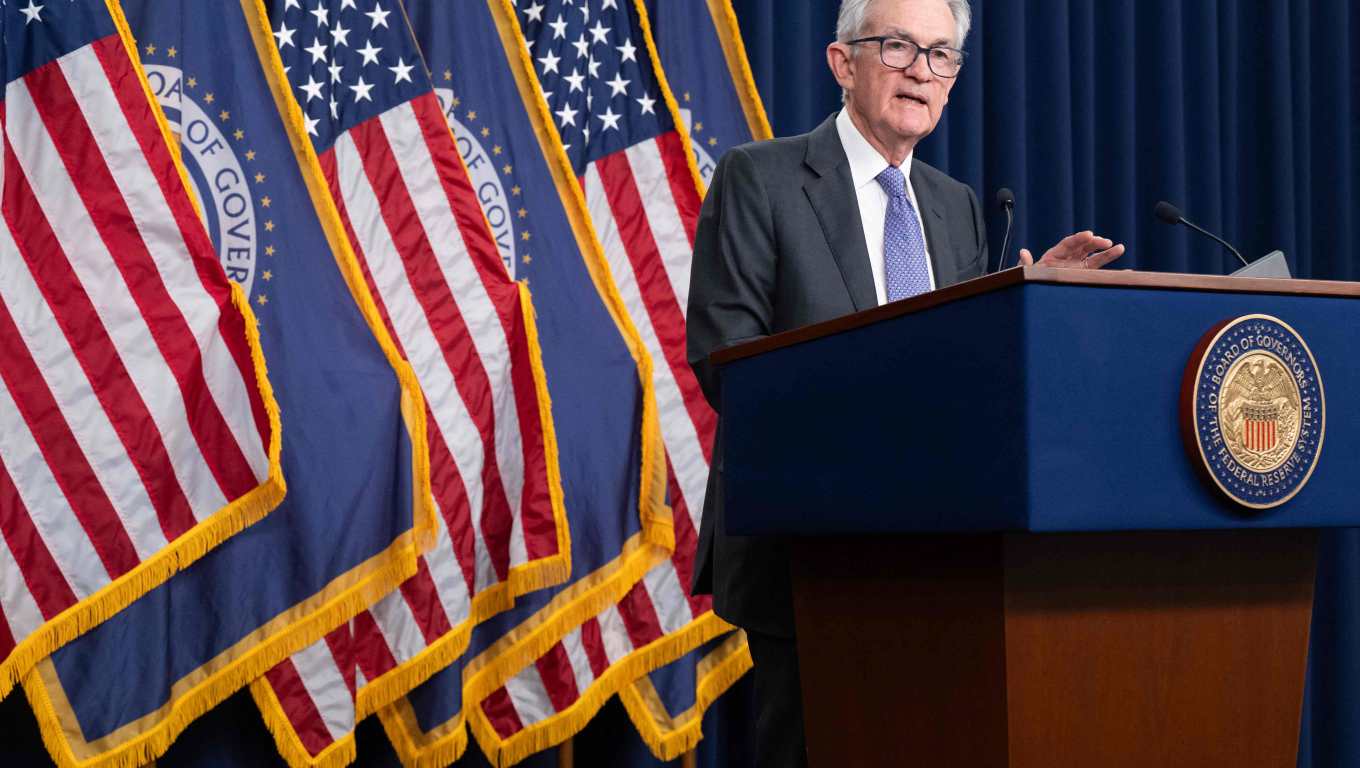 US Federal Reserve Board Chairman Jerome Powell speaks during a news conference following a Federal Open Market Committee (FOMC) meeting in Washington, DC, on December 10, 2025. A divided US Federal Reserve lowered interest rates Wednesday for a third consecutive time this year, flagging labor market concerns even as inflation remained elevated while President Donald Trump's tariffs bite. The cut by a quarter percentage point brings rates to a range between 3.50 percent and 3.75 percent, the lowest in around three years. (Photo by SAUL LOEB / AFP)