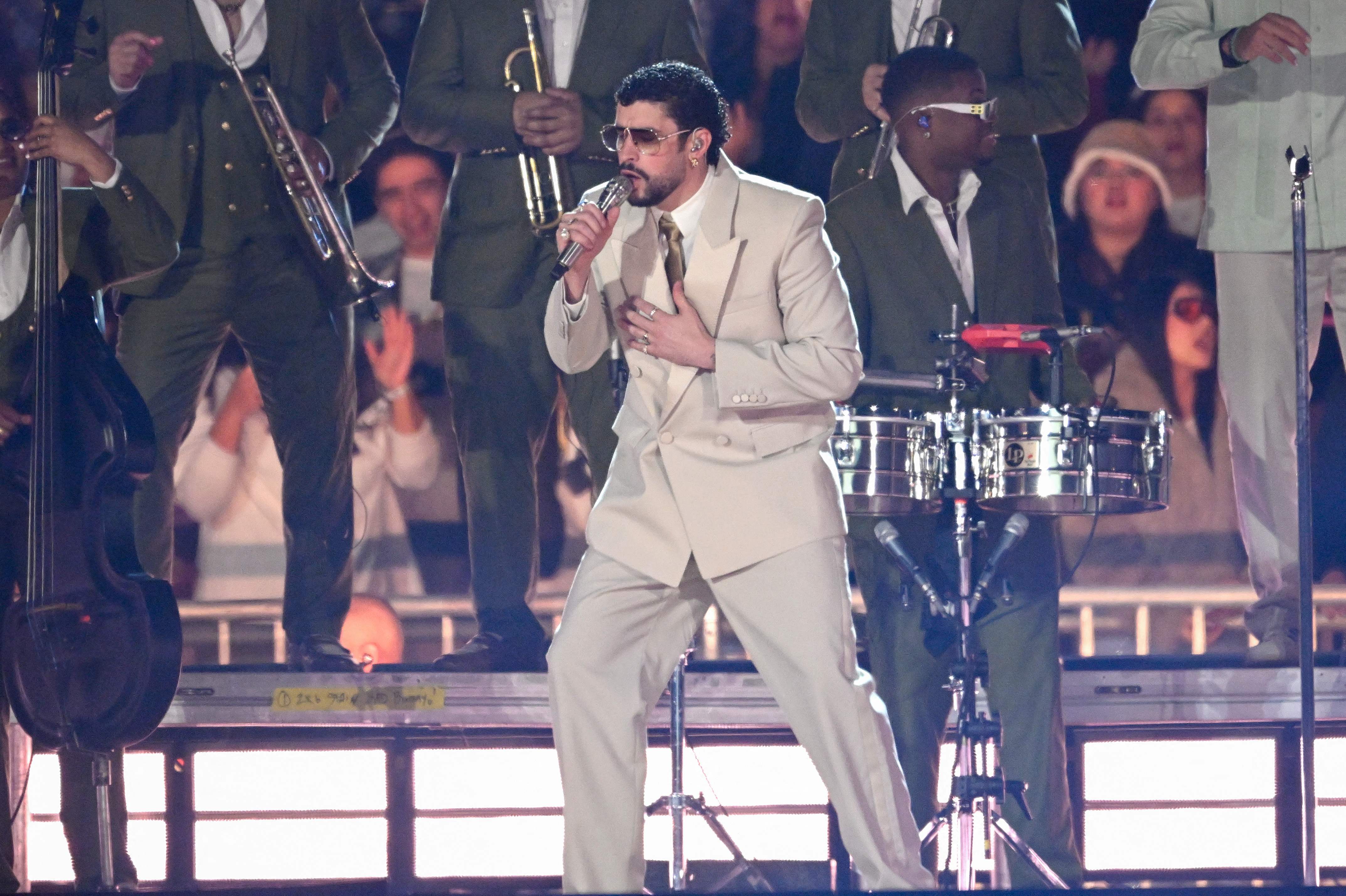 Puerto Rican rapper Bad Bunny performs on stage during his Debi tirar mas fotos world tour in Mexico City on December 10, 2025. (Photo by Alfredo ESTRELLA / AFP)