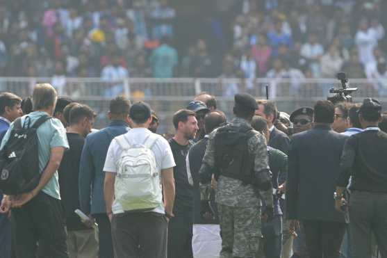 Inter Miami's Argentine forward #10 Lionel Messi (C) arrives at the Salt Lake Stadium in Kolkata on December 13, 2025. Thousands of fans packed into a stadium in eastern India on December 13 to cheer on Lionel Messi as the football legend unveiled a 21-metre (70-foot) statue of himself. (Photo by Dibyangshu SARKAR / AFP)