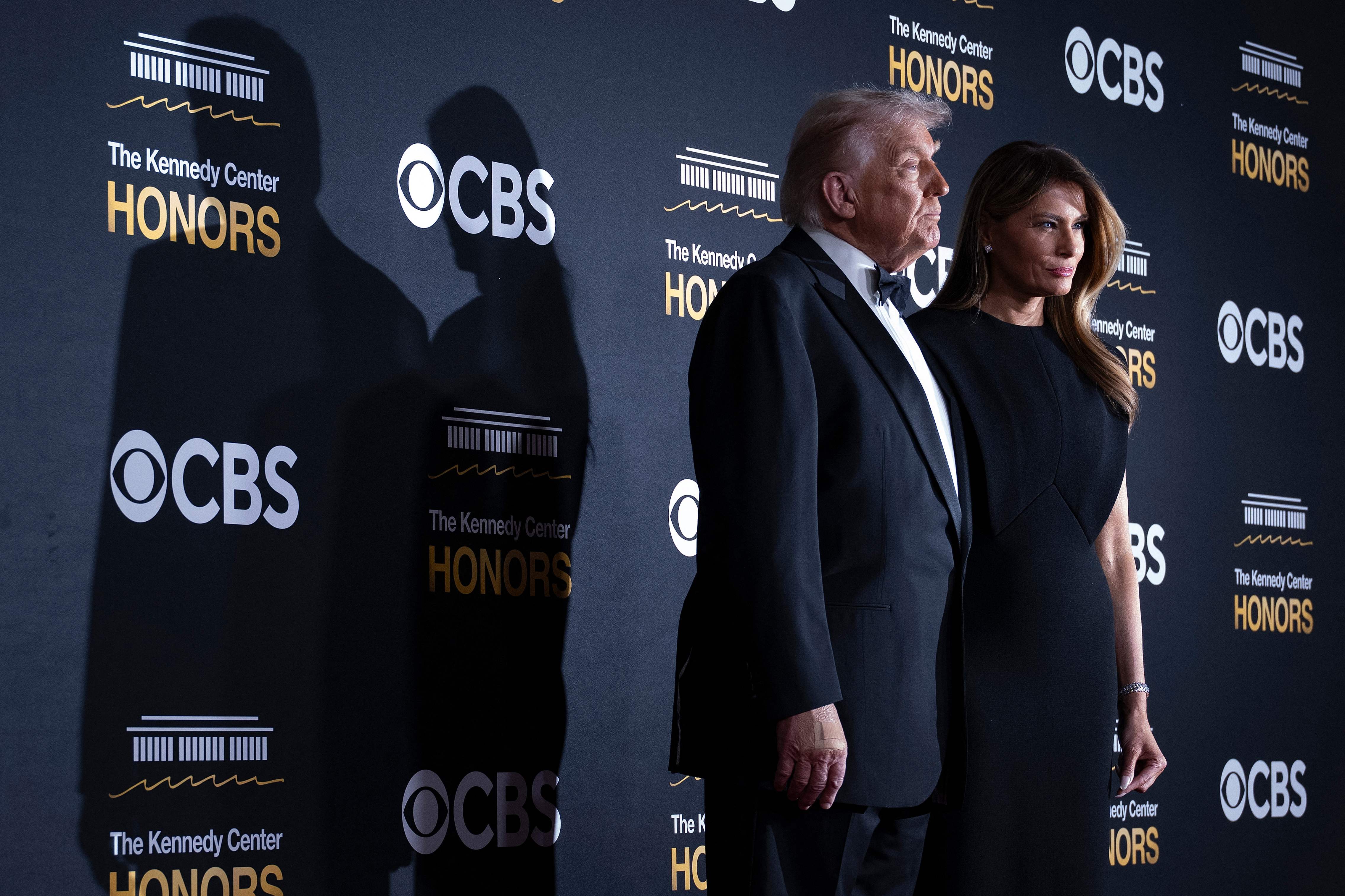 US President Donald Trump and First Lady Melania Trump arrive for the 48th Kennedy Center Honors gala at the Kennedy Center in Washington, DC, on December 7, 2025. (Photo by Brendan Smialowski / AFP)