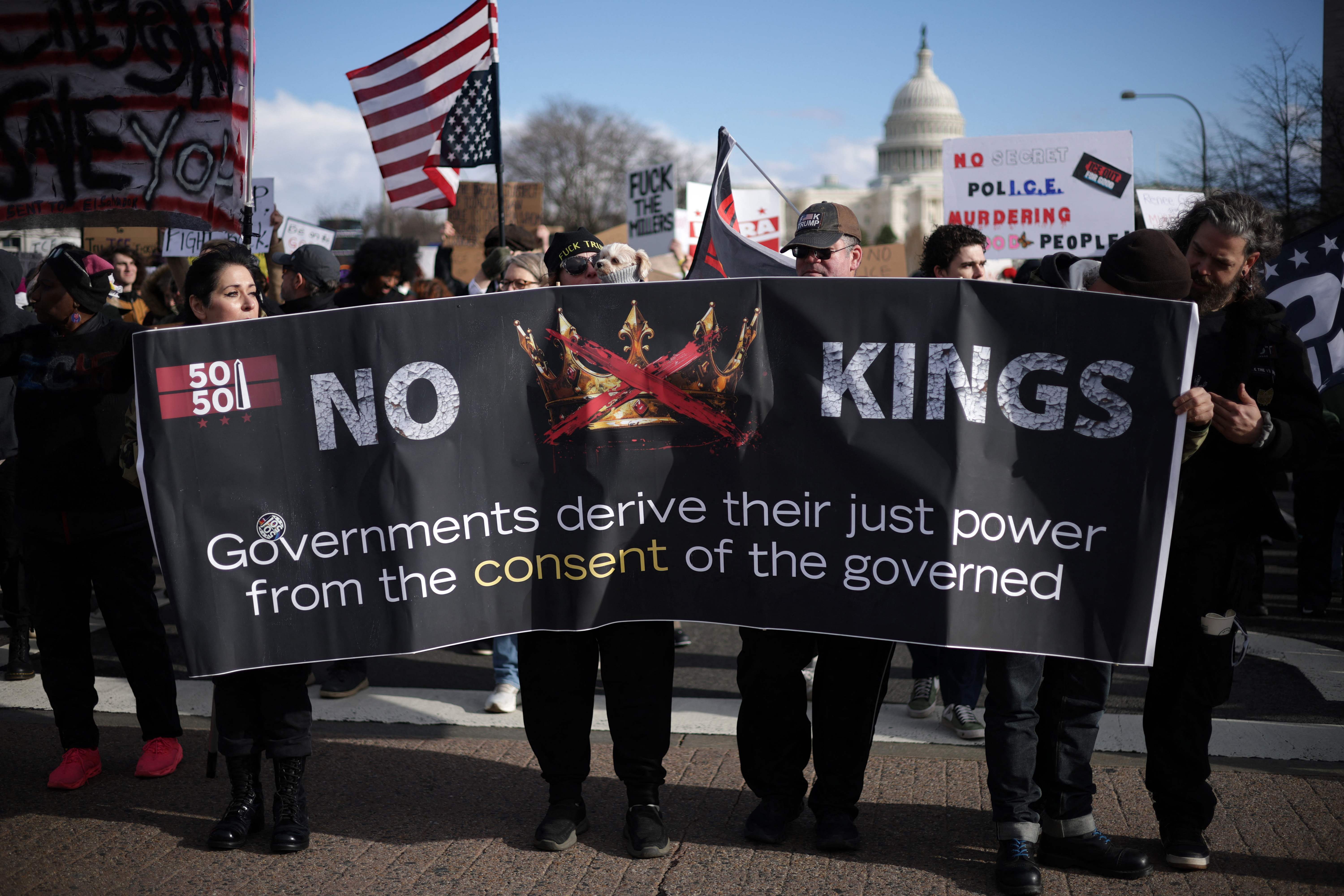 WASHINGTON, DC - JANUARY 11: Activists participate in a march to the headquarters of U.S. Immigration and Customs Enforcement (ICE) on January 11, 2026 in Washington, DC. Protests have broken out across the nation over the Trump administrations recent actions in Venezuela and the shooting death last week of Renee Good by an Immigration and Customs Enforcement (ICE) officer in Minneapolis, Minnesota.   Alex Wong/Getty Images/AFP (Photo by ALEX WONG / GETTY IMAGES NORTH AMERICA / Getty Images via AFP)