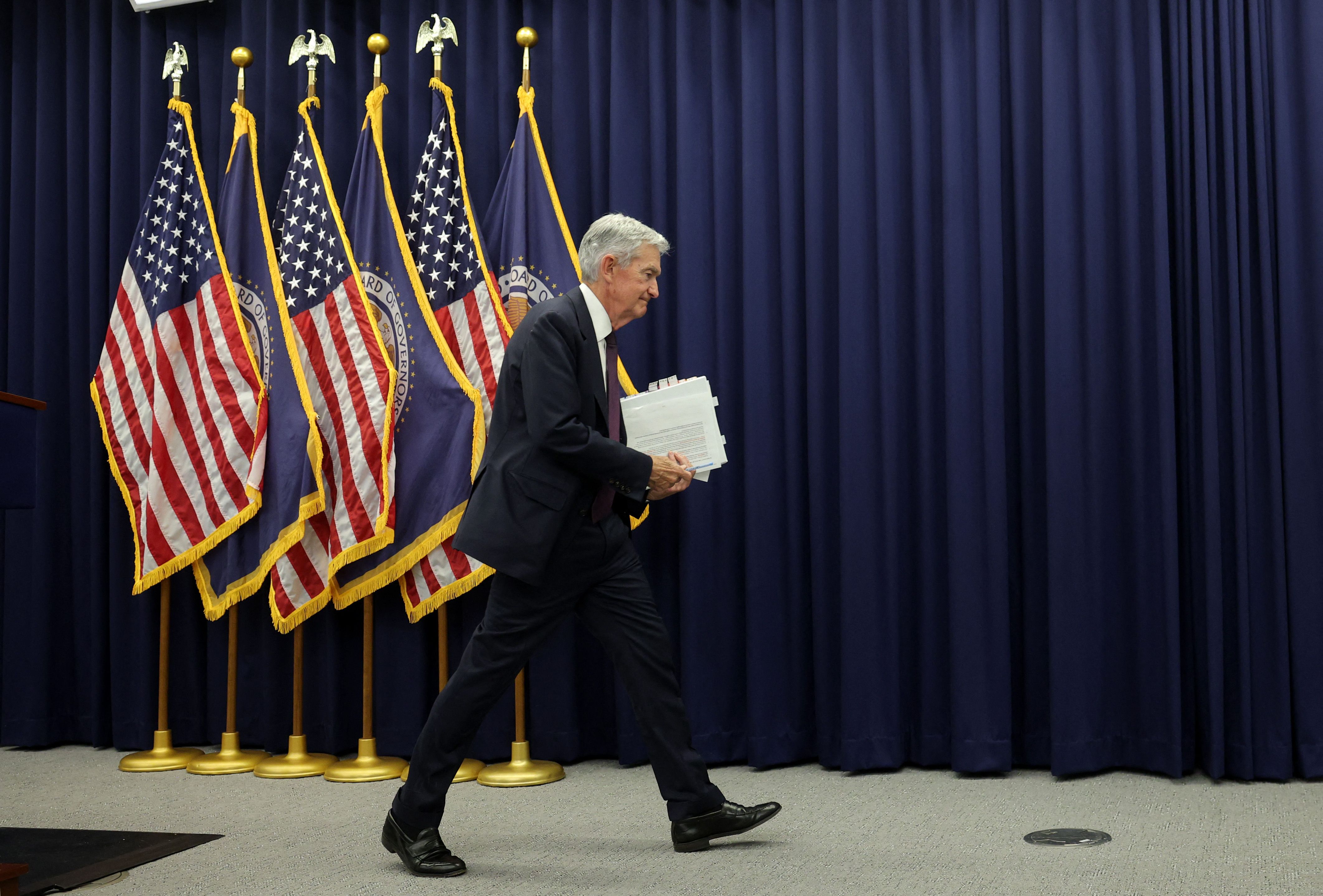WASHINGTON, DC - JANUARY 28: Federal Reserve Chair Jerome Powell departs after speaking during a press conference following the Federal Open Markets Committee meeting at the Federal Reserve on January 28, 2026 in Washington, DC. Powell announced that interest rates will remain steady at 3.5 - 3.75 percent.   Kevin Dietsch/Getty Images/AFP (Photo by Kevin Dietsch / GETTY IMAGES NORTH AMERICA / Getty Images via AFP)