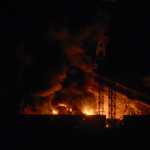 Picture of fire at Fuerte Tiuna, Venezuela's largest military complex, after a series of explosions in Caracas on January 3, 2026. Loud explosions, accompanied by sounds resembling aircraft flyovers, were heard in Caracas around 2:00 am (0600 GMT) on January 3, an AFP journalist reported. The explosions come as US President Donald Trump, who has deployed a navy task force to the Caribbean, raised the possibility of ground strikes against Venezuela. (Photo by Luis JAIMES / AFP)