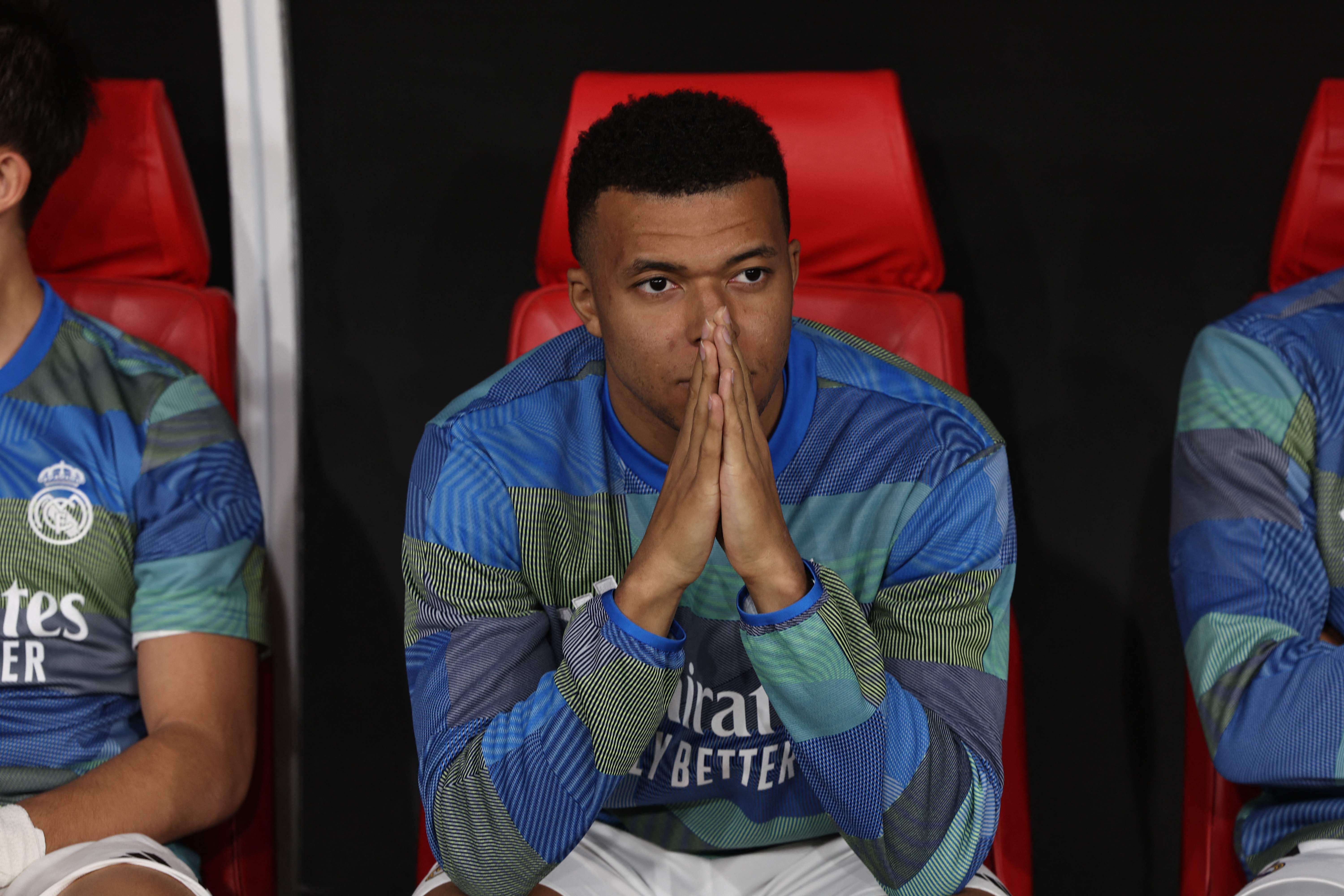 Real Madrid's French forward #10 Kylian Mbappe looks on prior to the start of Spanish Super Cup final football match between FC Barcelona and Real Madrid at the King Abdullah Stadium in Jeddah on January 11, 2026. (Photo by Fadel SENNA / AFP)