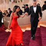 US actor George Clooney and wife Amal Clooney attend the 83rd annual Golden Globe Awards at the Beverly Hilton hotel in Beverly Hills, California, on January 11, 2026. (Photo by Frederic J. Brown / AFP) / -- IMAGE RESTRICTED TO EDITORIAL USE - STRICTLY NO COMMERCIAL USE --