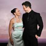 Australian actress Yerin Ha and British actor Luke Thompson arrive for the World premiere of "Bridgerton Season 4" at the Palais Brongniart in Paris on January 14, 2026. (Photo by JULIEN DE ROSA / AFP)